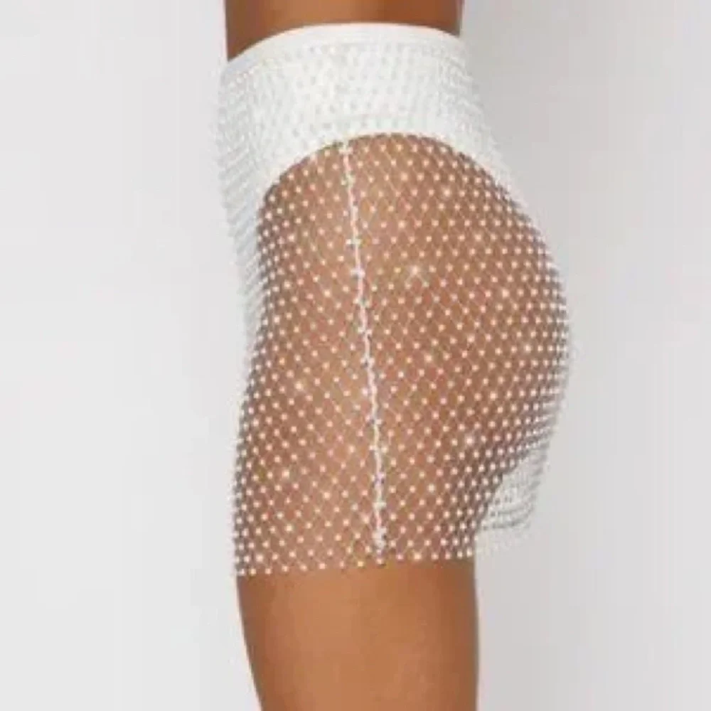 Feel the Beat Mini Skirt in white XS/S